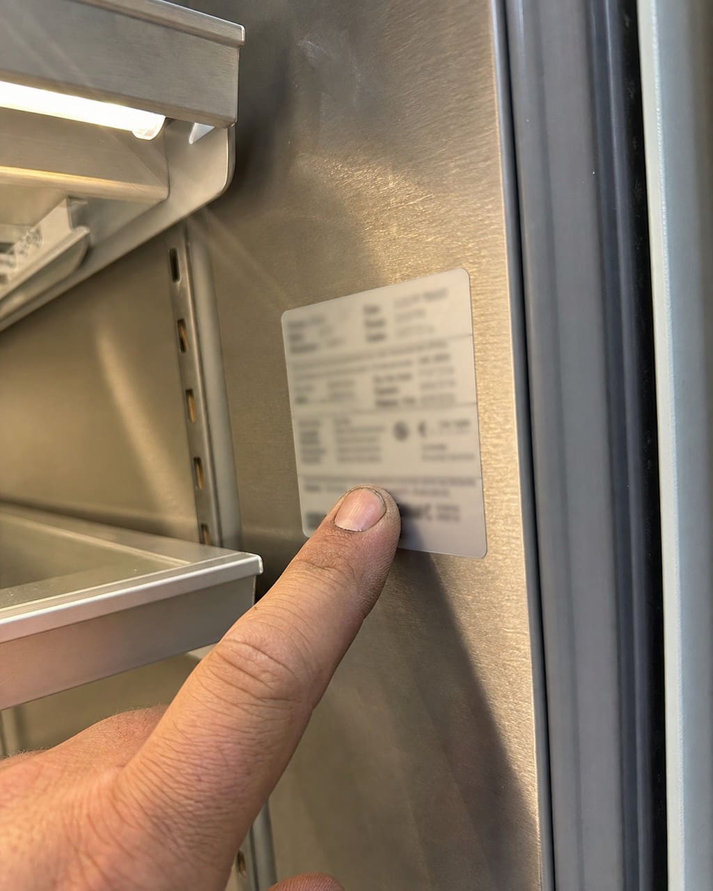 Locating the Sub-Zero model and serial tag in a Walnut Creek kitchen